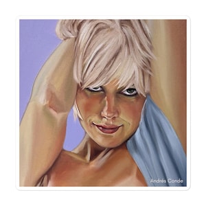 May include: A square sticker featuring a painted portrait of a person with short, light blonde hair. The person is looking directly at the viewer with a slight smile. The background is a light purple color. The artist's name, Andrés Conde, is in the bottom right corner.
