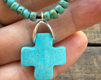 Turquoise Howlite Cross Necklace on Black Leather Cord