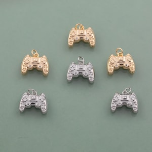 May include: A set of three ceramic mugs with a speckled, matte finish. The mugs are in shades of cream, light gray, and dark gray. Each mug has a simple, minimalist design, perfect for coffee or tea.