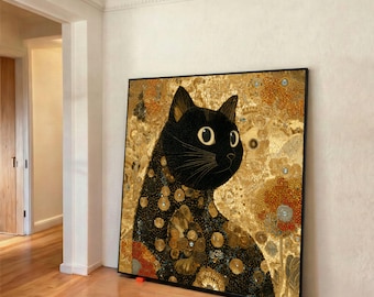 May include: A large square artwork featuring a black cat with large, round eyes. The cat is set against a gold and bronze floral background. The cat's fur is detailed with a pattern of gold and black circles and shapes. The artwork is framed in a black border.