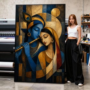 May include: A large rectangular wall art print featuring a stylised painting of two figures with closed eyes. The figure on the left has blue skin, a peacock feather in their hair, and plays a golden flute. The figure on the right has tan skin.
