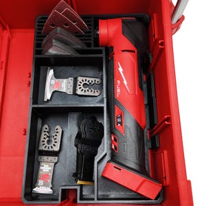 May include: A red and black multi-tool kit with various blades and sanding pads. The kit includes a red multi-tool, black storage compartments, and several blades and sanding pads for different applications. The kit is designed for versatility and ease of use.