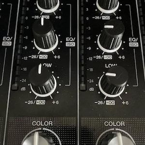 May include: A set of three ceramic mugs with a speckled, matte finish. The mugs are in shades of cream, light gray, and dark gray. Each mug has a simple, minimalist design and a rounded handle.