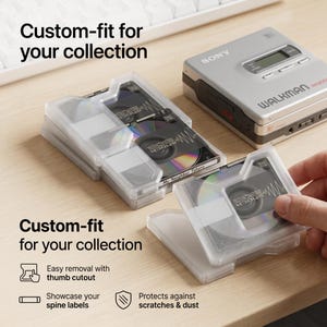 May include: Clear plastic cases designed to hold mini-discs, with the text "Custom-fit for your collection." A silver Sony Walkman is visible in the background. The cases are designed to protect against scratches and dust.