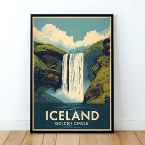 May include: A framed travel poster featuring a waterfall in Iceland. The poster has a vintage style with a blue, green, and beige color palette. The text "ICELAND GOLDEN CIRCLE" is at the bottom of the poster.