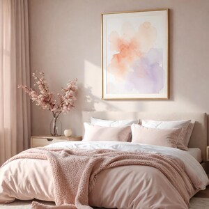 May include: A bedroom scene with a bed covered in light pink bedding, including a blanket and pillows. A framed watercolor painting hangs above the bed. The room is decorated in soft pink tones, with sheer curtains and a vase of flowers.