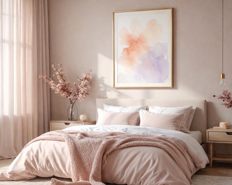 May include: A bedroom scene with a bed covered in light pink bedding, including a blanket and pillows. A framed watercolor painting hangs above the bed. The room is decorated in soft pink tones, with sheer curtains and a vase of flowers.