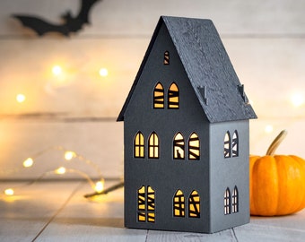 The haunted maison de ville - an eerie and elegant paper Halloween luminary that stores perfectly flat between seasons