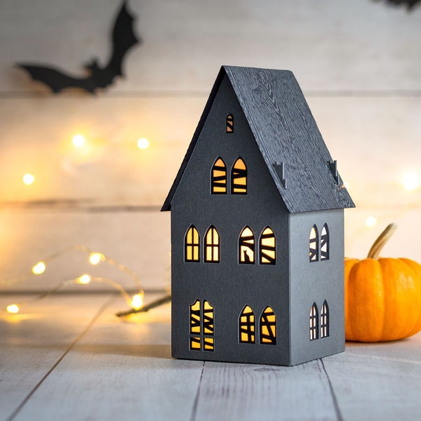The haunted maison de ville - an eerie and elegant paper Halloween luminary that stores perfectly flat between seasons