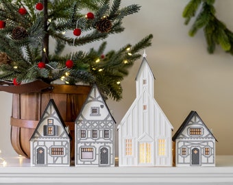 ETSY DESIGN AWARDS finalist 2023: Half-Timbered Layered Paper Christmas Village - folds perfectly flat to store