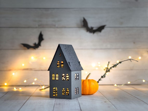 The haunted maison de ville - an eerie and elegant paper Halloween luminary that stores perfectly flat between seasons