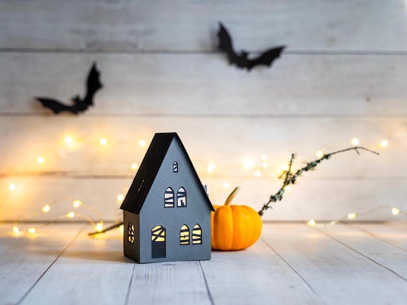 Haunted House Luminary - handmade of artisan paper with Halloween black cat and bat details. Folds perfectly flat to store.