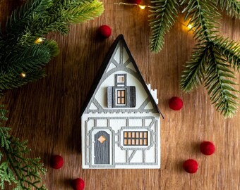 Christmas village paper luminary house, handcrafted of beautifully textured papers & folds perfectly flat to store