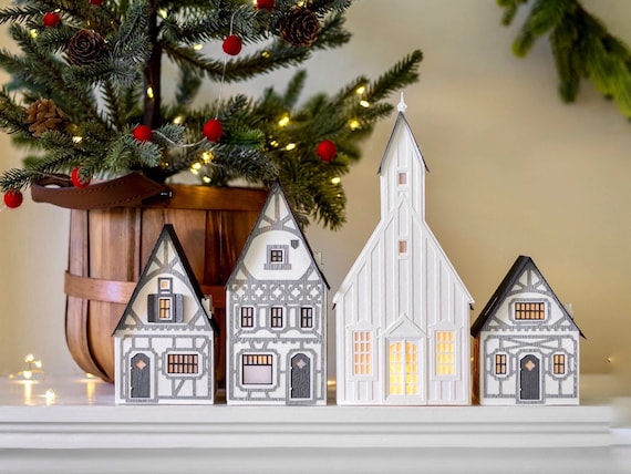 ETSY DESIGN AWARDS finalist 2023: Half-Timbered Layered Paper Christmas Village - folds perfectly flat to store