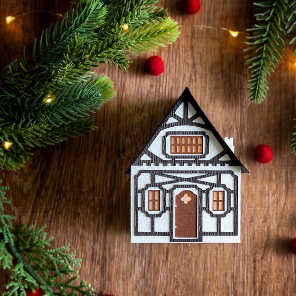 Christmas village house: half-timbered cottage luminary handcrafted of heavyweight watercolor paper, folds flat to store