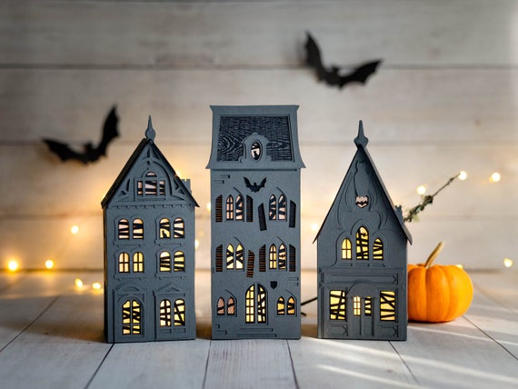 Haunted Halloween set of two handmade paper luminaries, spooky & sustainable fall decor that folds perfectly flat to store