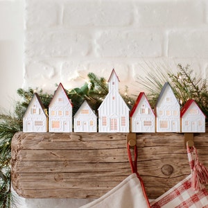 Lighted Christmas Village: holiday decorations handcrafted of layered paper, folds flat to store image 1