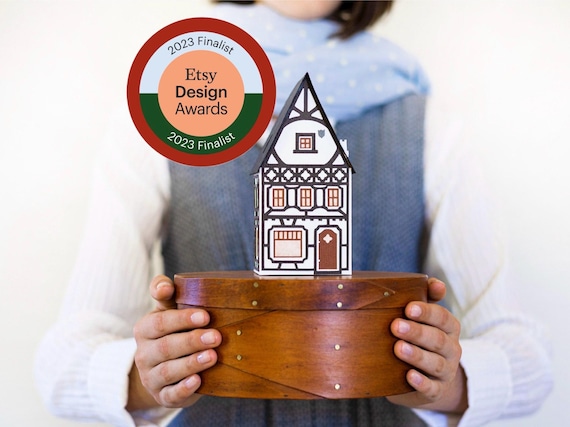 Christmas Village House - a paper holiday luminary from my Etsy Design Award finalist collection. Folds perfectly flat for easy storage.