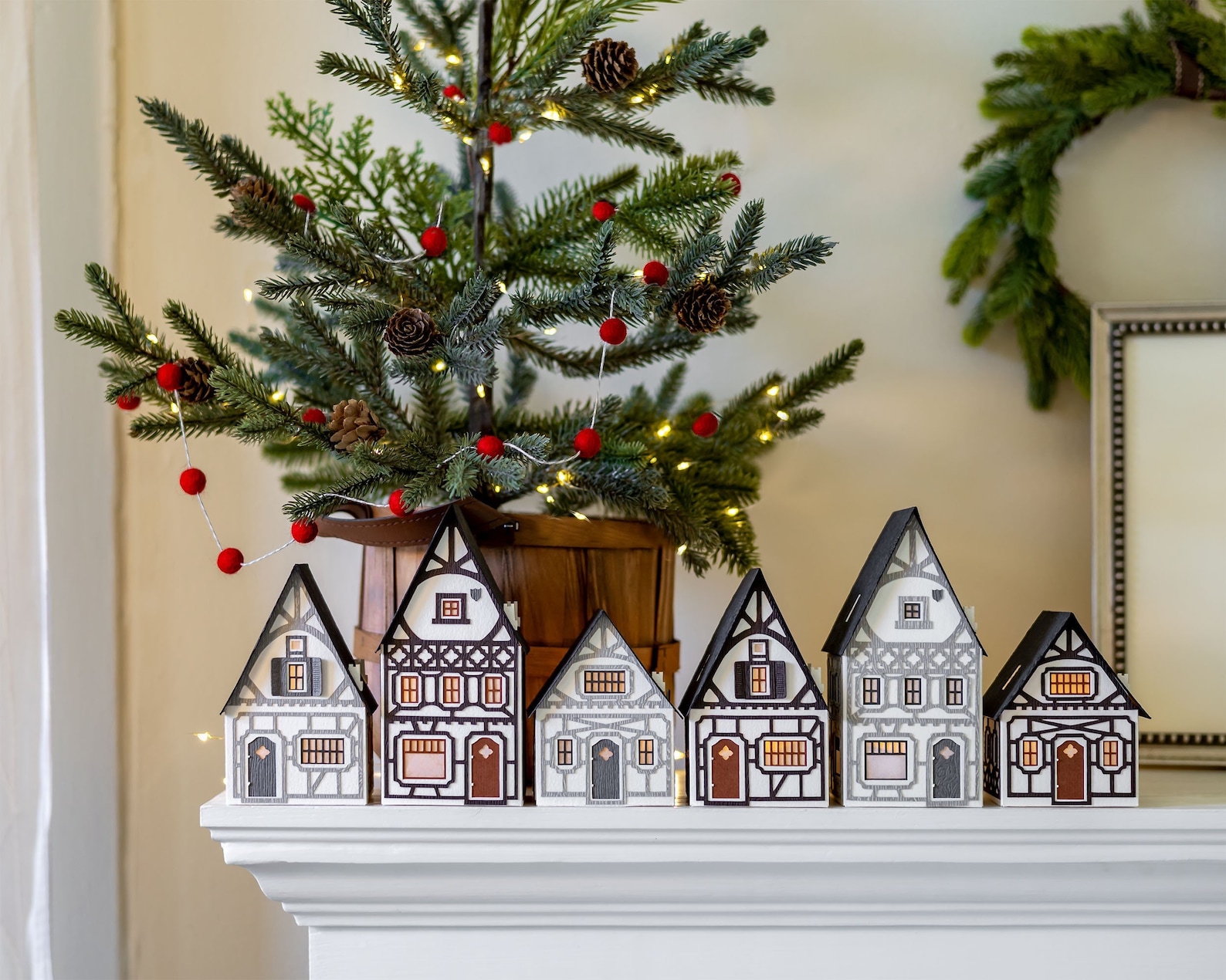 Christmas village, handcrafted holiday decor made of heavyweight watercolor paper, folds flat to store