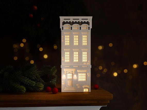 Brownstone Paper Luminary - handmade holiday decor. Folds flat for easy storage.