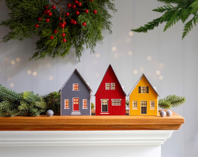 Handcrafted Scandinavian Christmas Village: paper house luminary set, folds perfectly flat to store
