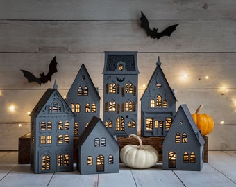 Haunted Halloween village of 6 beautiful & sustainable lighted luminaries, handmade of archival paper, folds perfectly flat for storage