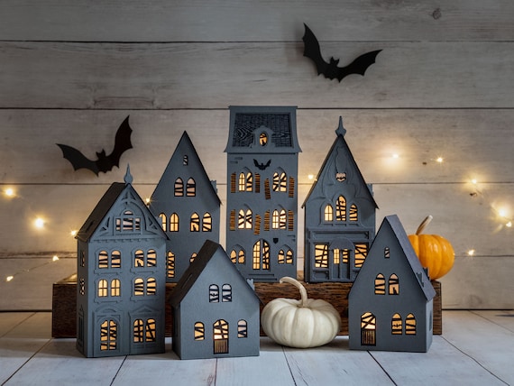 Haunted Halloween village of 6 beautiful & sustainable lighted luminaries, handmade of archival paper, folds perfectly flat for storage
