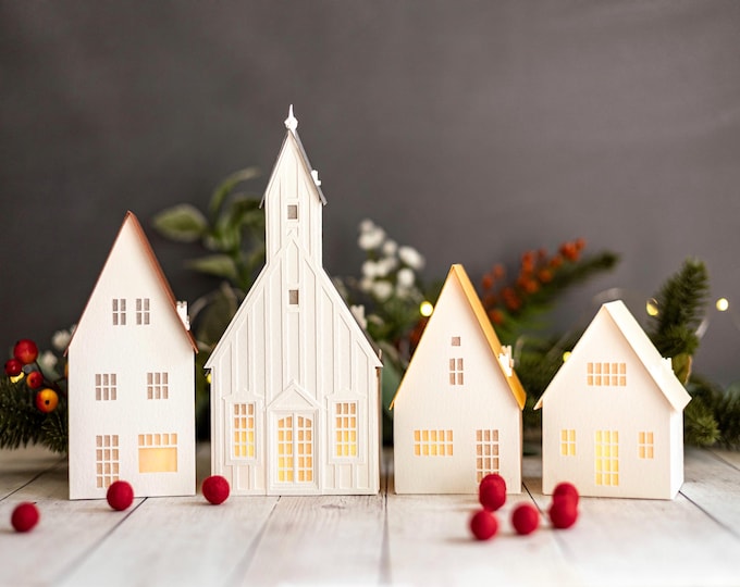 Neutral Christmas Village Luminary Set: handcrafted from sustainable paper, folds perfectly flat to store