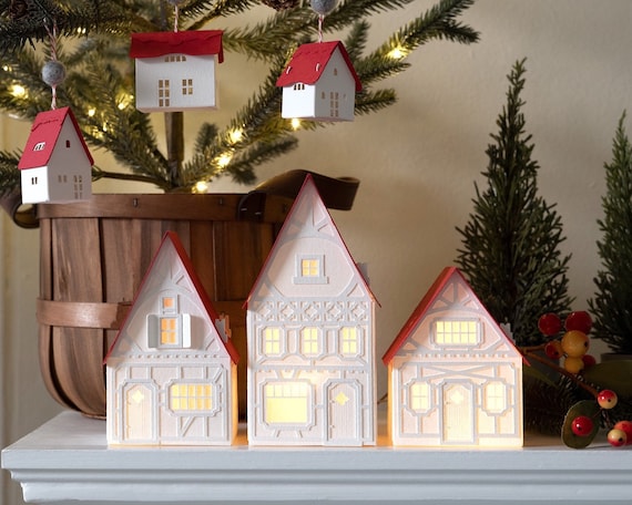 Handmade Christmas Village: white mantel decor of layered paper, folds completely flat to store