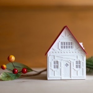 Lighted Christmas Village: holiday decorations handcrafted of layered paper, folds flat to store image 8