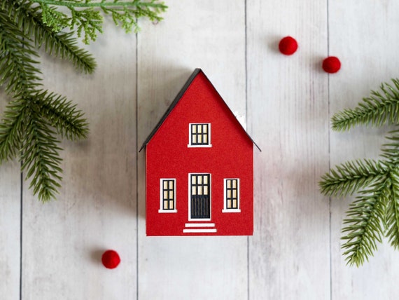 Scandinavian Shop Christmas Luminary - handcrafted of layered artisan papers and folds perfectly flat for simple storage