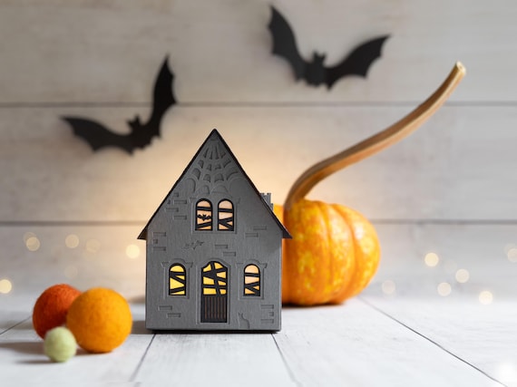 Haunted Halloween Luminary Cottage: handmade of artisan papers with black cat and bat details, folds perfectly flat to store.