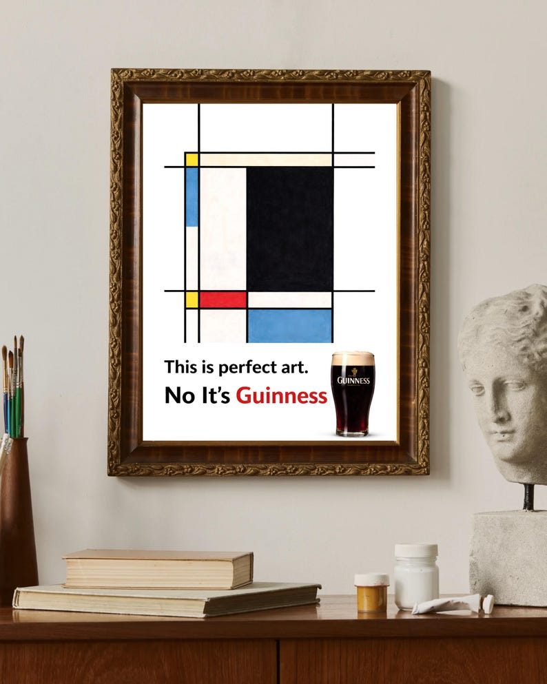 May include: A framed print featuring a Mondrian-style abstract design with black, white, red, yellow, and blue blocks. The print includes a pint of Guinness and the text "This is perfect art. No It's Guinness."