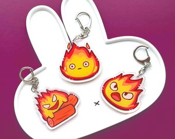 Chaveiros combinando de demônios com fogo amigo de anime