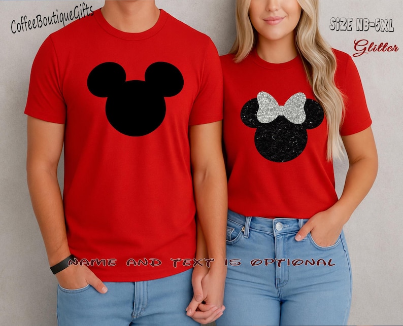 May include: Red t-shirts with black Mickey Mouse and Minnie Mouse designs. The Mickey Mouse design is a solid black silhouette, while the Minnie Mouse design features a glittery black head and a silver bow. The text "NAME AND TEXT IS OPTIONAL" is visible.