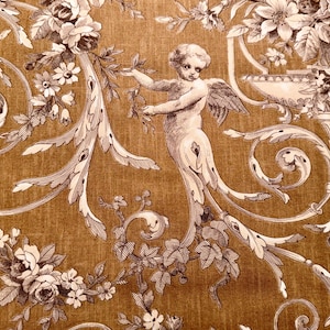 May include: A detailed, sepia-toned pattern featuring a cherub with wings, floral arrangements, and ornate scrollwork. The design includes roses, daisies, and other flowers, creating a classical, vintage aesthetic. The background has a textured, golden-brown appearance.