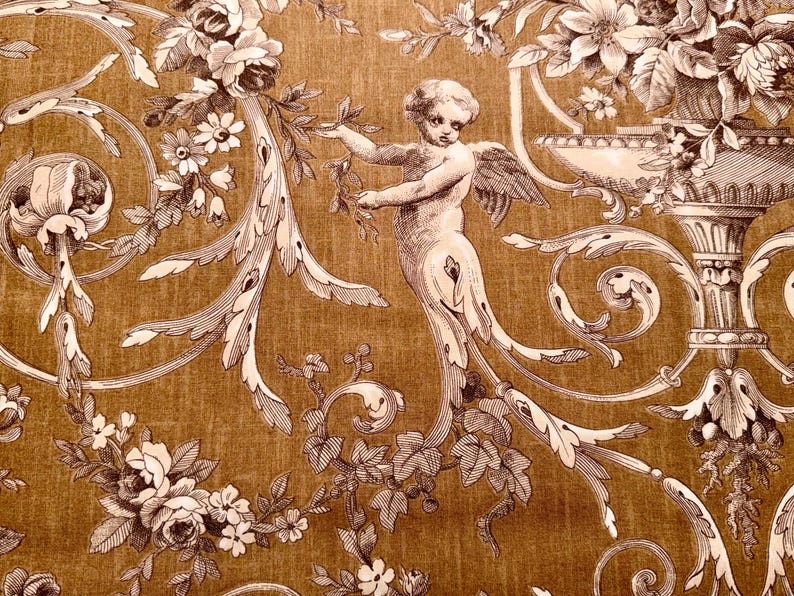 May include: A detailed, sepia-toned pattern featuring a cherub with wings, floral arrangements, and ornate scrollwork. The design includes roses, daisies, and other flowers, creating a classical, vintage aesthetic. The background has a textured, golden-brown appearance.