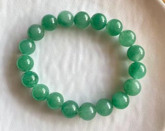 Pulseira elástica com contas redondas de pedra preciosa verde de 10 mm, um presente da sorte com efeito de cura energética.