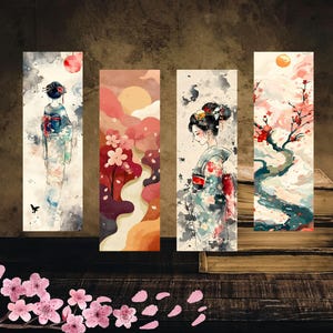 以下が含まれることがあります： 日本の芸者と風景を描いた4つの水彩画のブックマーク。ブックマークは、伝統的な衣装を着た芸者、桜、暖かい色使いの穏やかな風景を特徴としています。ブックマークは木製の表面に表示されています。