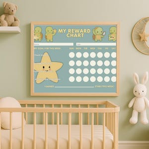 May include: A framed reward chart with the text "MY REWARD CHART" and illustrations of turtles and a star. The chart is light blue with a wooden frame, designed for tracking goals and rewards. A nursery theme.