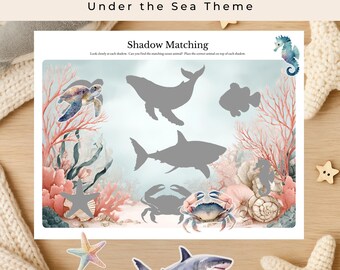 May include: A shadow matching game with an "Under the Sea" theme. The game features illustrations of sea creatures, including a whale, shark, and crab. The text "Shadow Matching" is at the top of the game board.