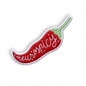 May include: Embroidered red chili pepper patch with the word "neurospicy" in white script. The patch has a white border and green stem. A fun accessory for jackets, bags, or other fabric items.