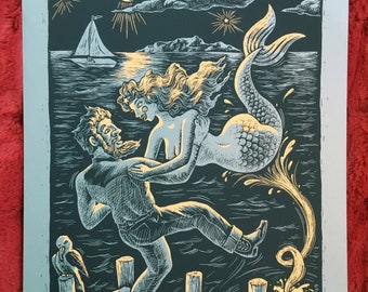 Under A Newport Moon is a limited edition silkscreen print by Dan Blakeslee depicting a man and a mermaid dancing under the moon at dockside