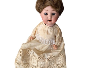 Antique Bisque and composition Doll Marked 6/0 X