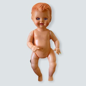 Vintage plastic doll with sleepy eyes