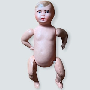 Antique 3 inch celluloid doll