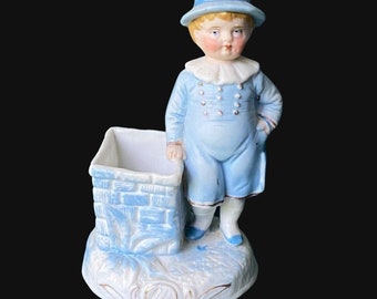 Antique boy figurine match holder