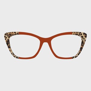 May include: Eyeglasses with a cat-eye frame in a warm brown color. The outer edges of the frames feature a leopard print pattern. The lenses are clear, and the glasses are set against a plain background.