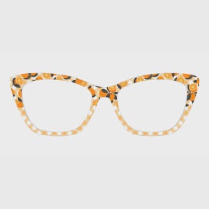 May include: Cat-eye glasses frames featuring a repeating pattern of orange slices and dark green leaves set against a light yellow and white gingham checkered background. The frames have a distinct pointed outer edge and a smooth, rounded inner rim.