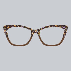 Könnte beinhalten: Brille mit einem dunkelbraunen Rahmen und einem floralen Muster auf dem oberen Teil. Das Muster umfasst gelbe Sonnenblumen, lila Blumen und grüne Blätter auf einem dunkelbraunen Hintergrund. Der untere Teil des Rahmens ist einfarbig braun.